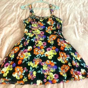 Black flowered dress with stewpot detail